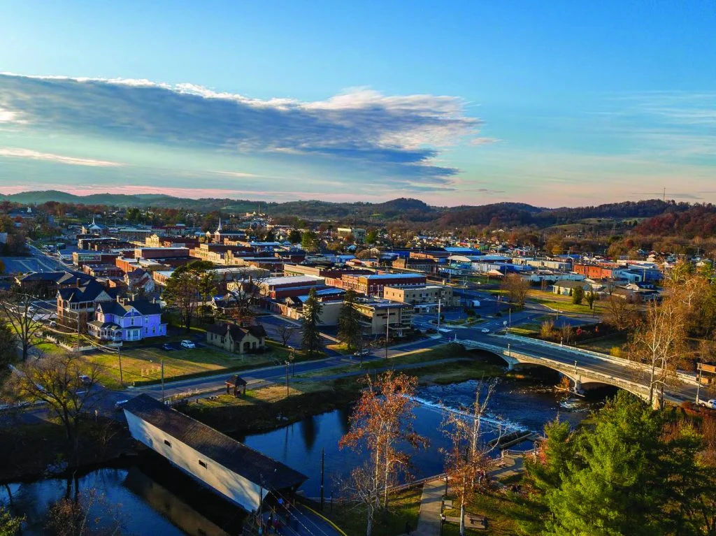Aerial view of Elizabethton with the covered bridge and downtown at golden hour
